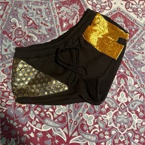 The Elephant Tribe Golden Teacher Booty Shorts